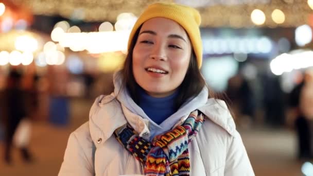 Young Asian Woman Walking Holiday Evening Street Drinking Hot Tea — Stock Video