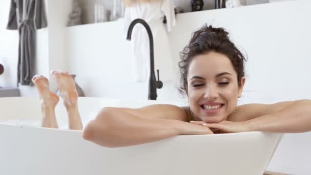 Portrait Happy Smiling Woman Lying Tub Relaxing Looking Camera Slowmotion Video Clip