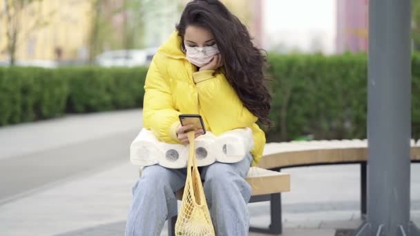 Emotional Woman Sitting Bench Shopping Stuff Wearing Face Mask Slowmotion — Stock Video