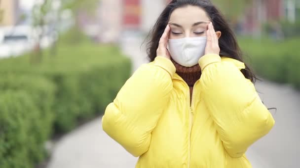 Close Portrait Young Woman Walking Street Headache Wearing Protective Mask — Stock Video