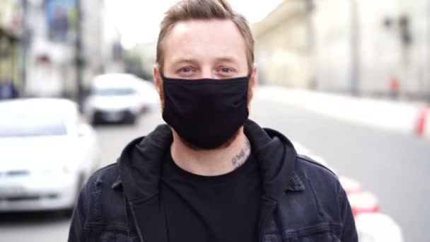 Close Portrait Adult Man Black Face Mask Standing Street Looking — Stock Video