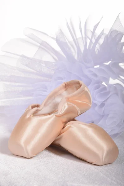 New ballet slippers for classical dance with tulle dress Stock Photo