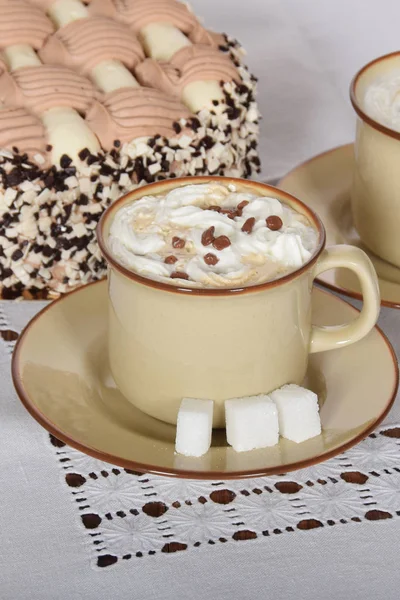 Coffee with whipped cream and chocolate and coffee with cream ca — Stock Photo, Image