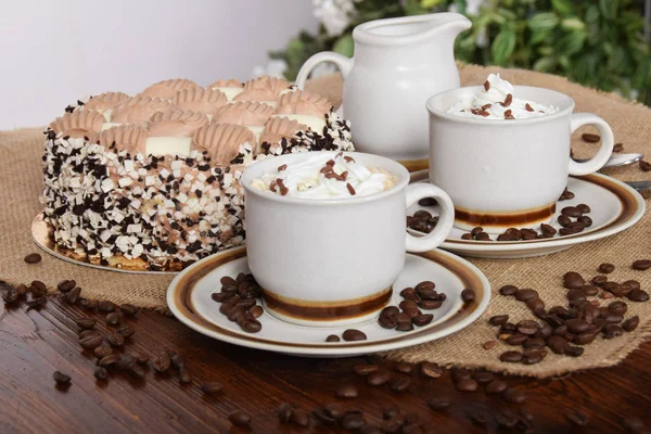 Coffee with whipped cream and chocolate and coffee with cream ca — Stock Photo, Image