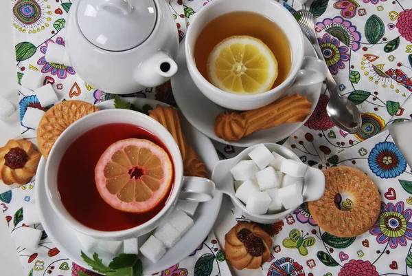 Hot tea from dried fruit with lemon and honey on a  serviette — Stock Photo, Image