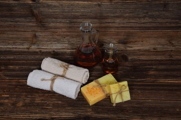 Two homemade glycerine soaps with peel orange peel pieces and pa — Stock Photo, Image