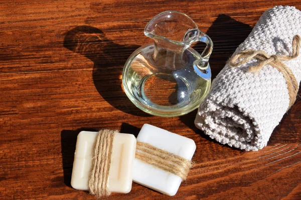 Handmade Soaps Body Oil Glass Jug Next Towel — Stock Photo, Image