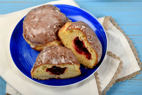 donuts stuffed with raspberry jam