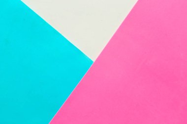 Geometrik pembe, beyaz ve mavi kağıt arkaplan dokusu