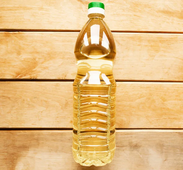Botella Aceite Girasol Sobre Fondo Madera — Foto de Stock
