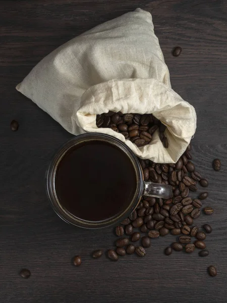 Glass Mug Fresh Black Natural Coffee Bag Coffee Grains Sprinkled — Stock Photo, Image