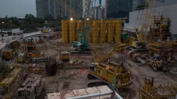 Timelapse of works on construction site in the evening — Stock Video