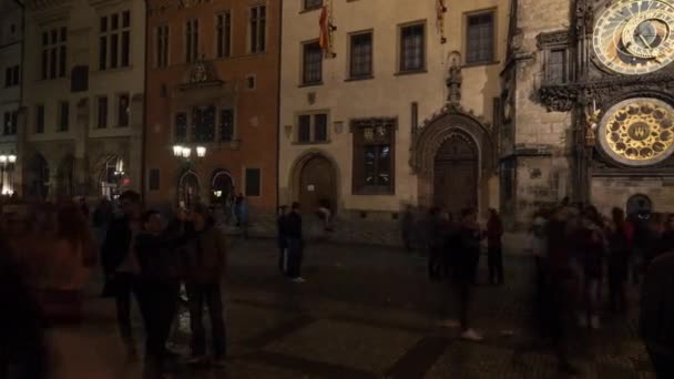 Timelapse of people near Prague astronomical clock at night — Stock Video