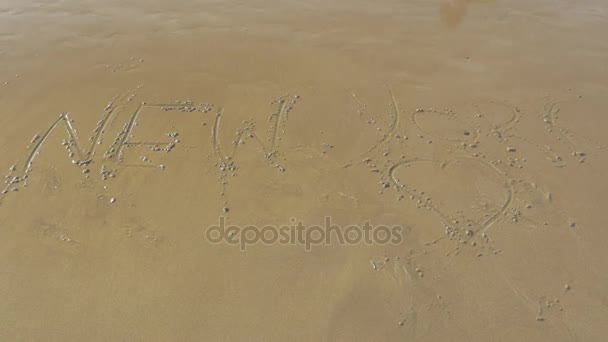 New York with heart drawn on sand — Stock Video