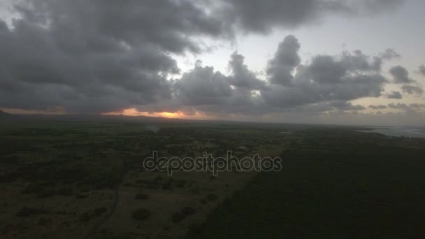 Aerial view of Mauritius Island, forests, farm, fields and hills against sunset sky and pink clouds — Stock Video