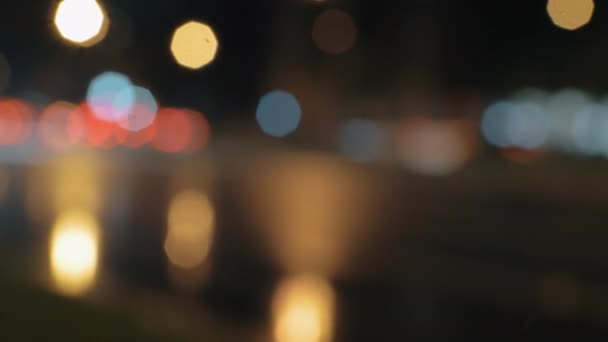 Defocus of car traffic at night — Stock Video