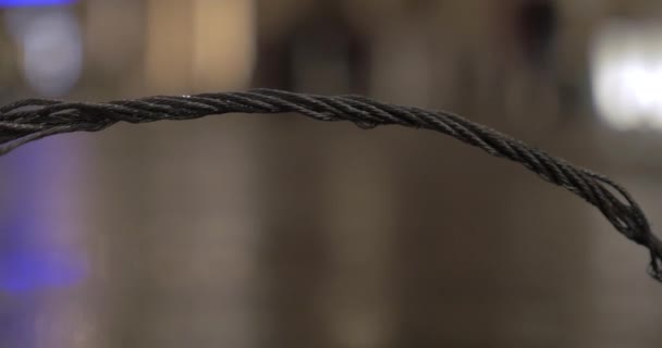 Frayed metal rope in the street — Stock Video