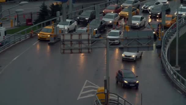 Timelapse of car traffic on the road with barrier arm — Stock Video