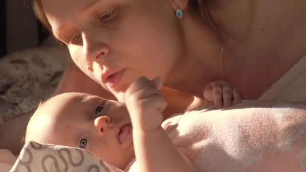 Loving mother kissing baby — Stock Video