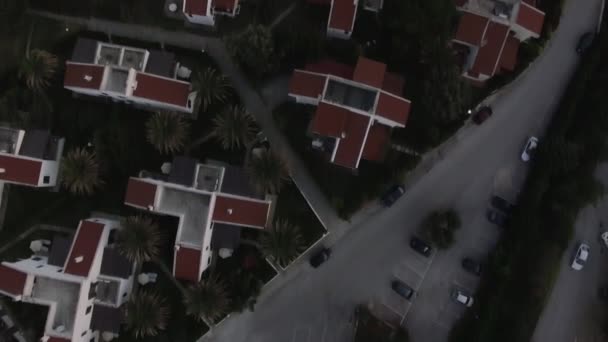 Aerial view of resort with cottages on the sea shore. Trikorfo Beach, Greece — Stock Video
