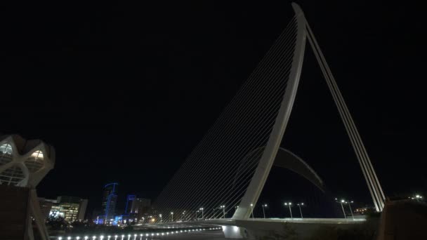 Night cityscape of Valencia with the Assut de lOr Bridge, timelapse — Stock Video