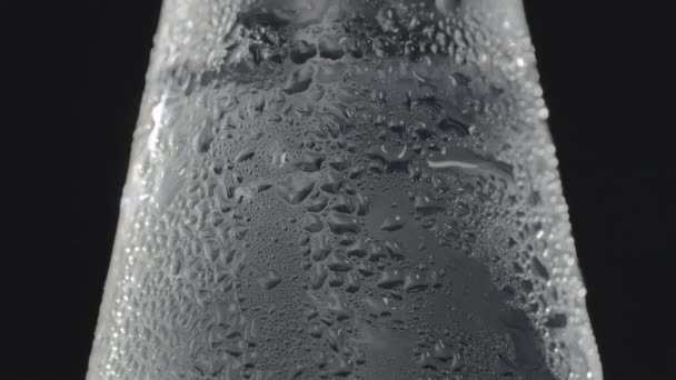 Glass bottle with sparkling cold drink — Stock Video