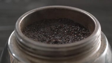 Moka pot coffee maker in use