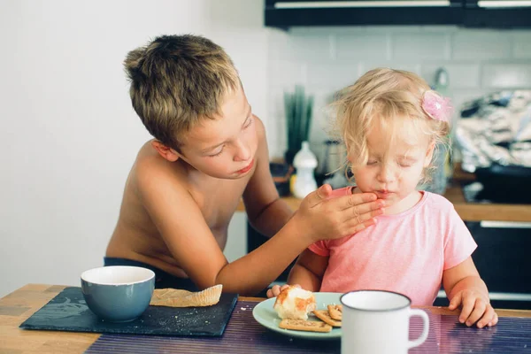 Little girl is taken care of. Brother always looking after her — Stock Photo, Image