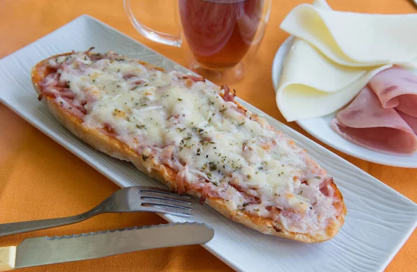 Bread pizza with ham and cheese — Stock Photo, Image