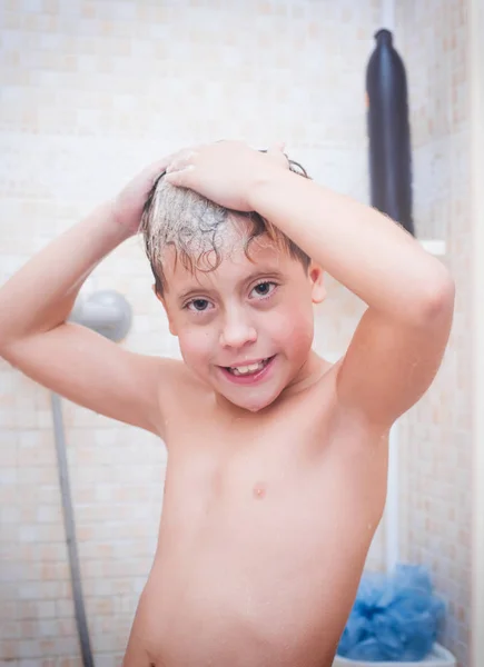 Lovely boy bathes in the shower — Stock Photo, Image