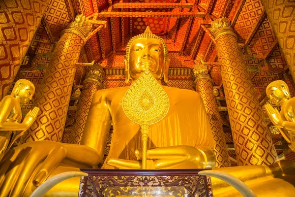 The large beautiful golden buddha statue in church of Wat Phanan