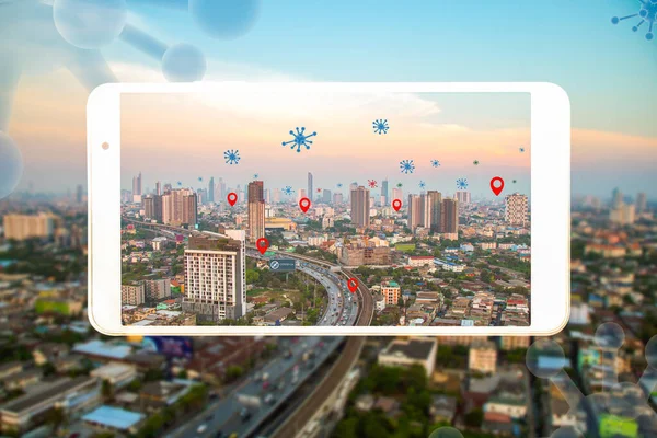 High angle view of cityscape with corona virus icon and check point in smart phone frame.