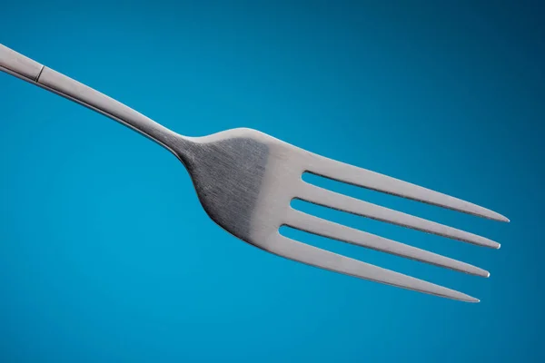 Empty Fork in Blue Background — Stock Photo, Image