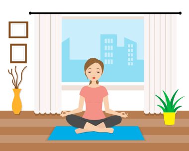 Evde yoga yapan bir kadın.