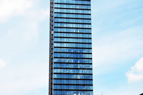 Tall apartment buildings on blue sky background — Stock Photo, Image