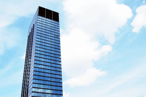 Tall apartment buildings on blue sky background — Stock Photo, Image