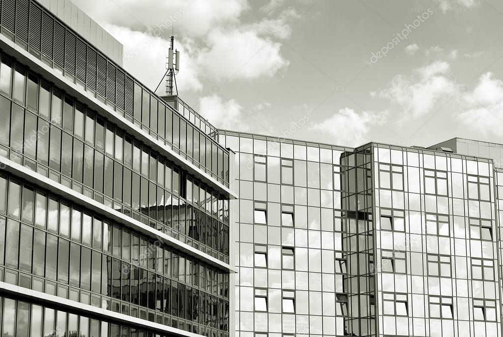 Modern business office building exterior. Black and white