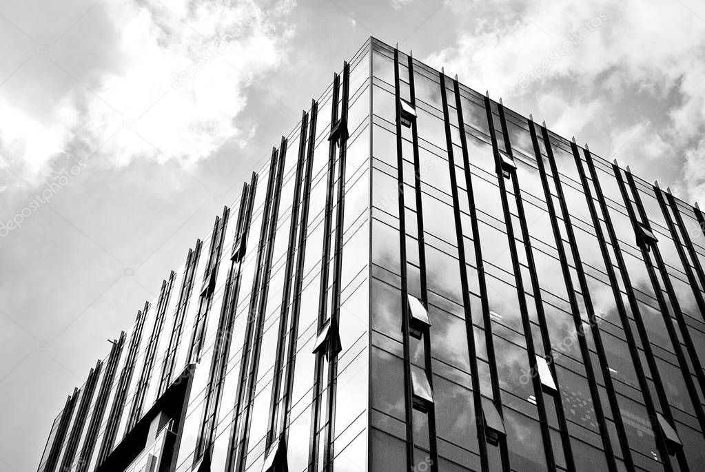 Modern business office building exterior. Black and white