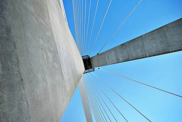 Modern bridge pylon against a blue sky — Stock Photo, Image