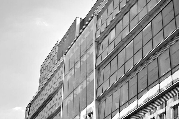 Facade - shapes from a modern building, with structural lines reflection