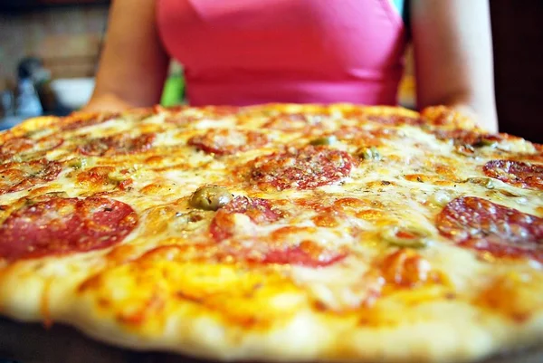 Round sausage pizza Margherita on a white plate. — Stock Photo, Image