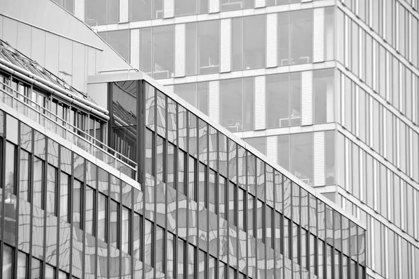 Office building. Business building. Exterior of building. Black and white.