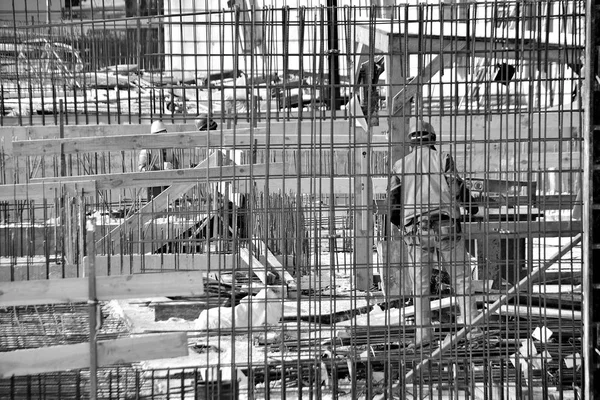 construction site workers, black and white