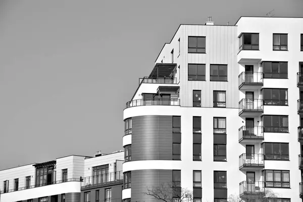 Facade of a modern apartment building. Black and white