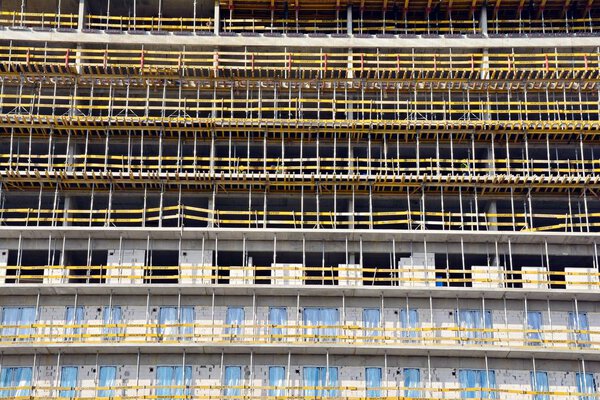 Construction site with crane and building