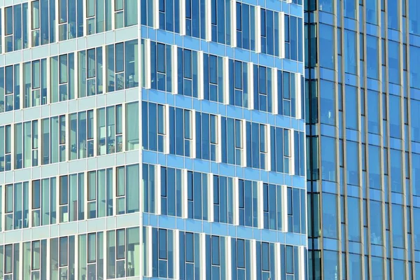 Glass walls of a office building - business background