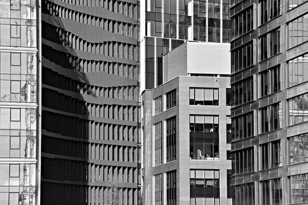 Glass walls of a office building - business background. Black and white.