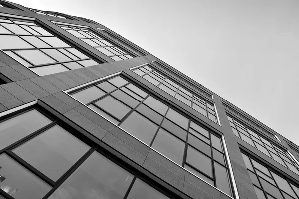 Glass walls of a office building - business background. Black and white.