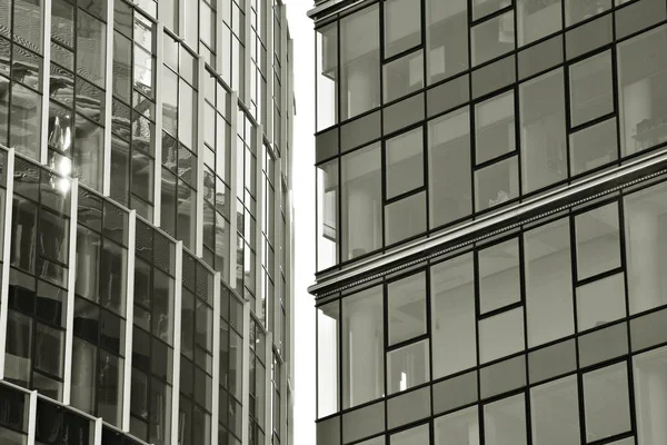 Glass walls of a office building - business background. Black and white.