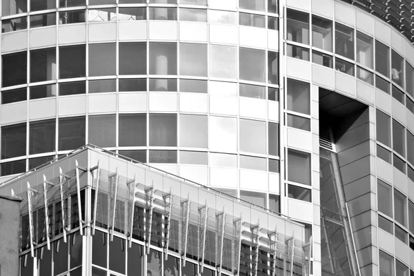 Glass walls of a office building - business background. Black and white.